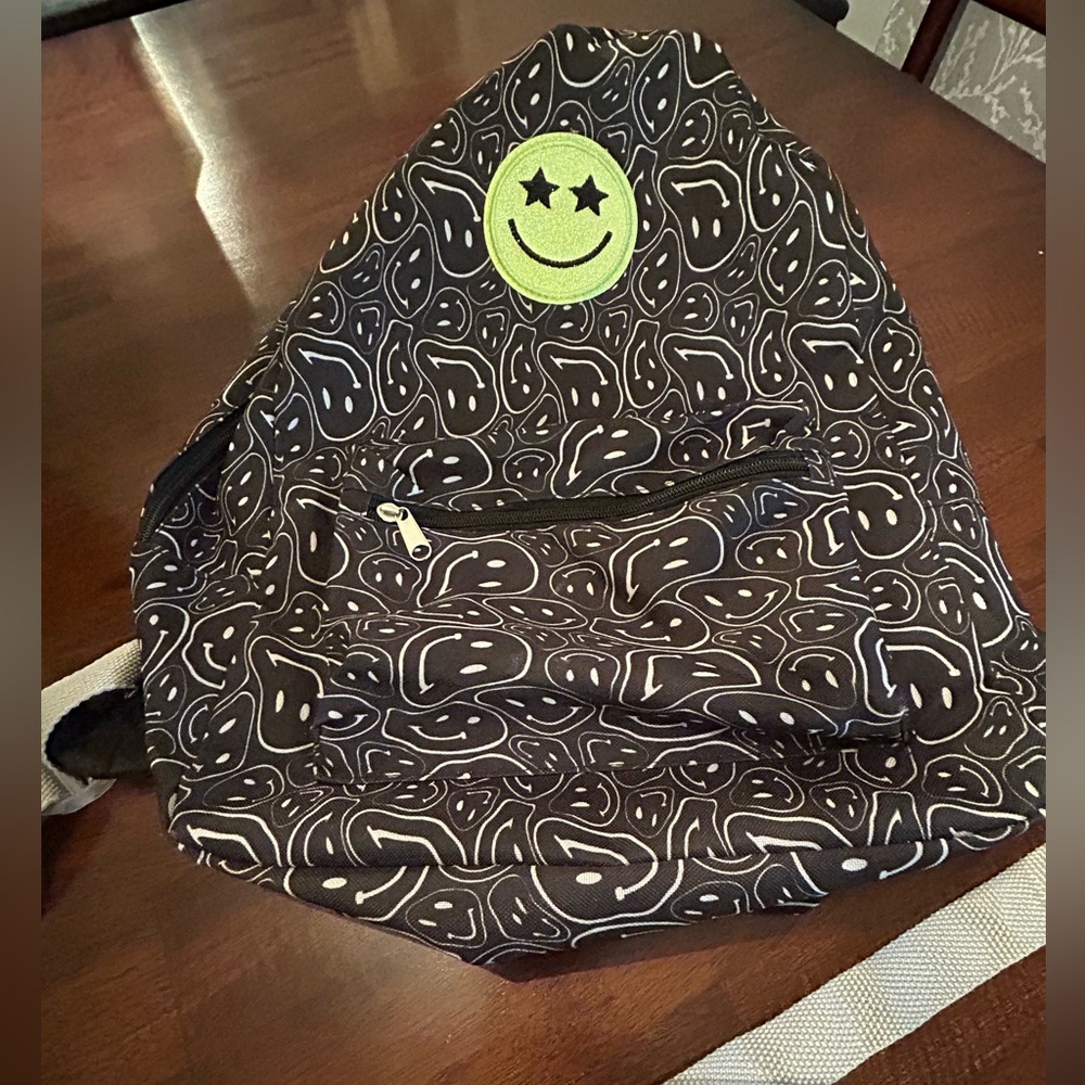Black And White Patterned Backpack With Smiley Fa… - image 1